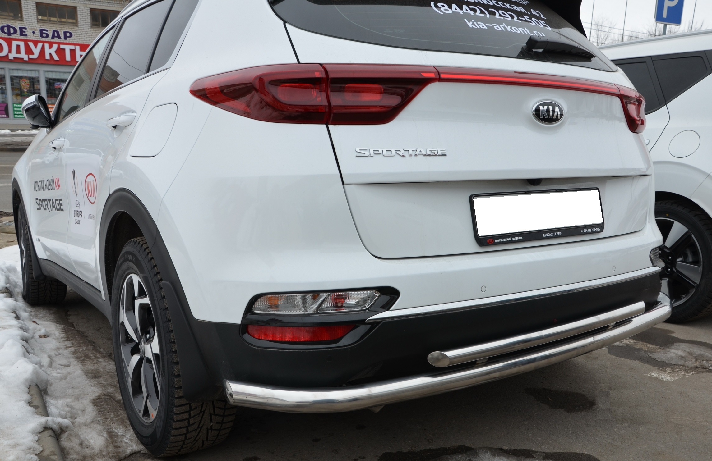 Защита заднего бампера угловая большая двойная d60/42 мм для Kia Sportage IV Рестайлинг