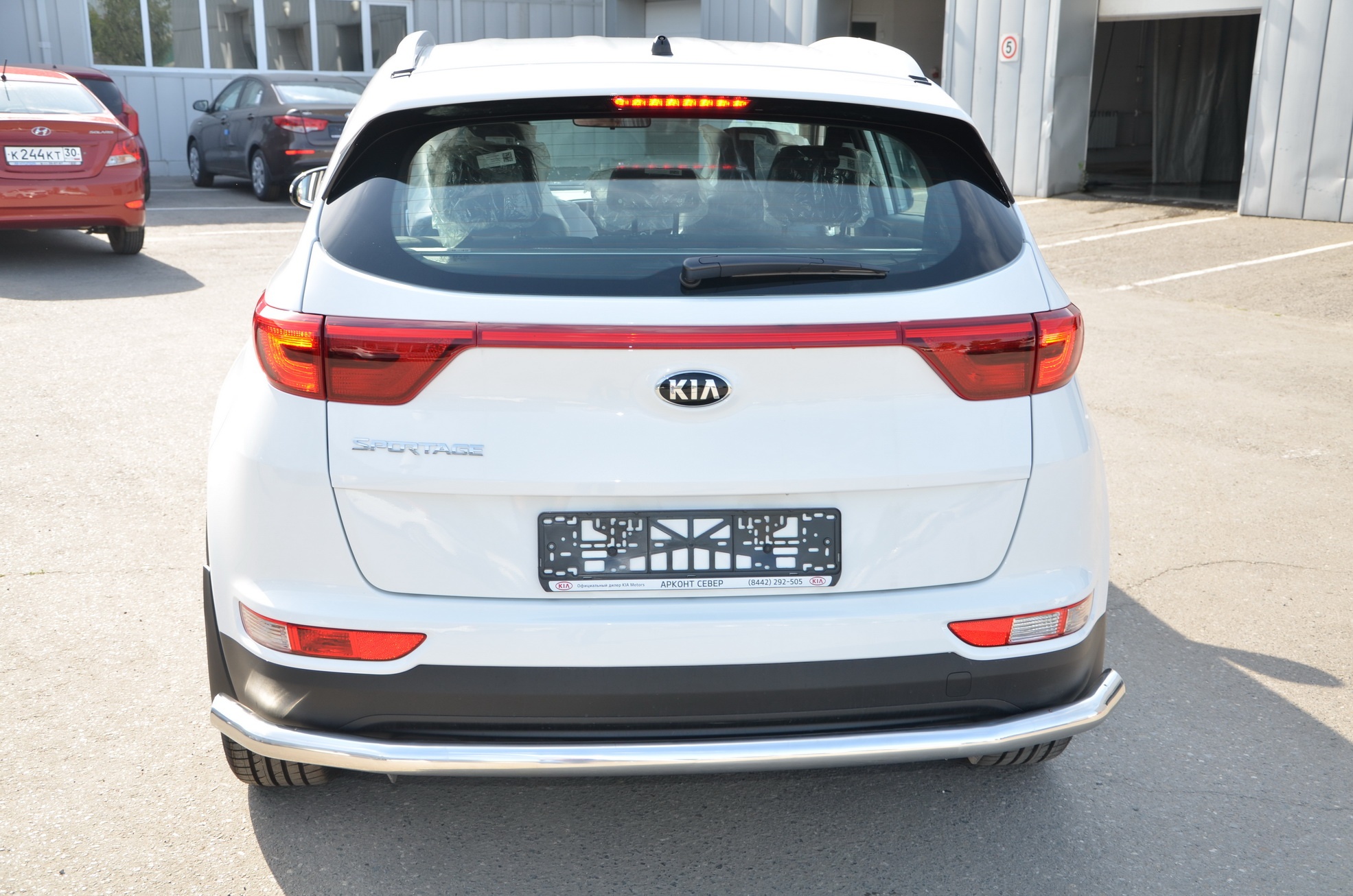 Защита заднего бампера угловая большая d60 мм для Kia Sportage III Рестайлинг