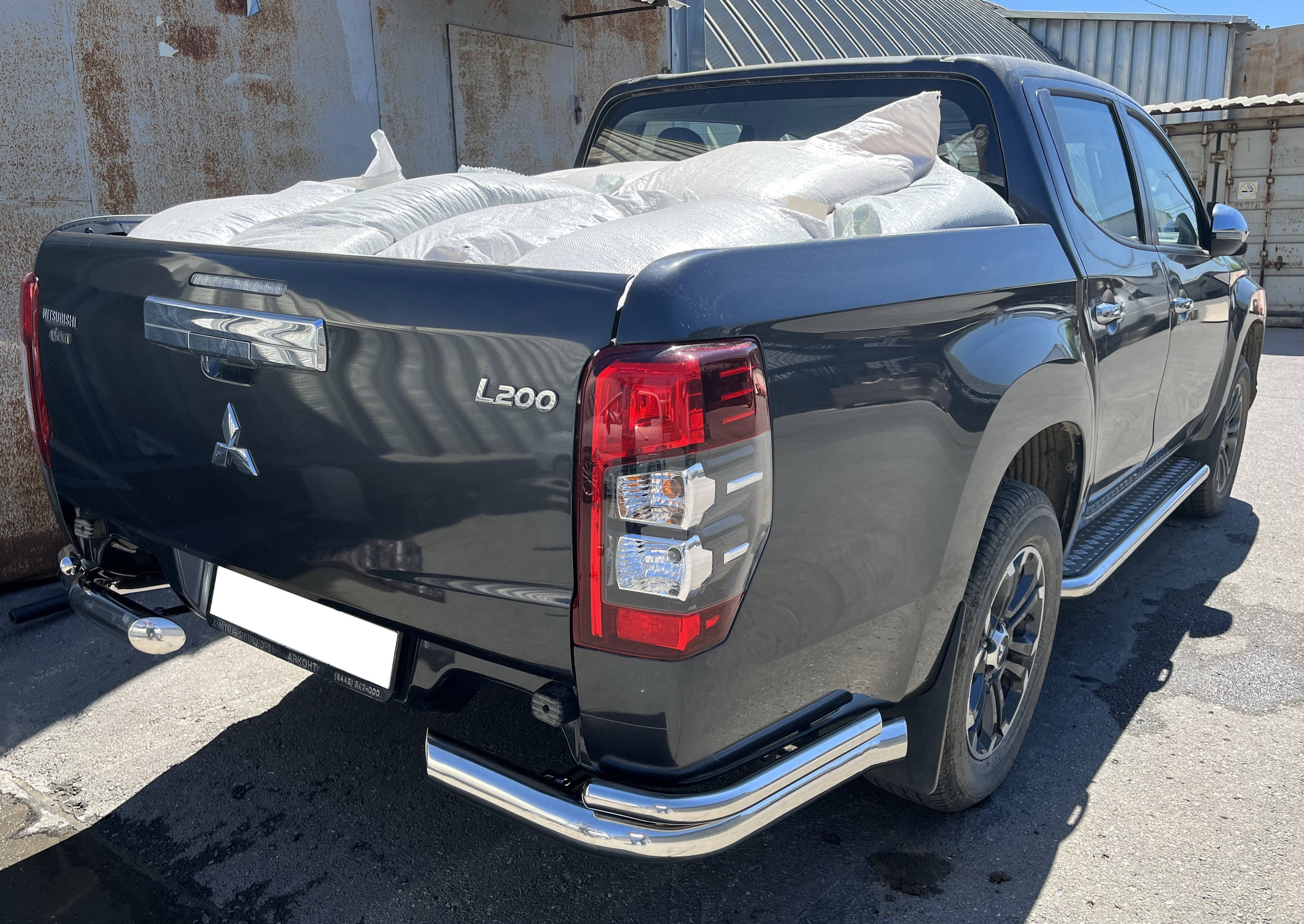 Защита заднего бампера угловая двойная d76/42 мм для Mitsubishi L200 V Рестайлинг