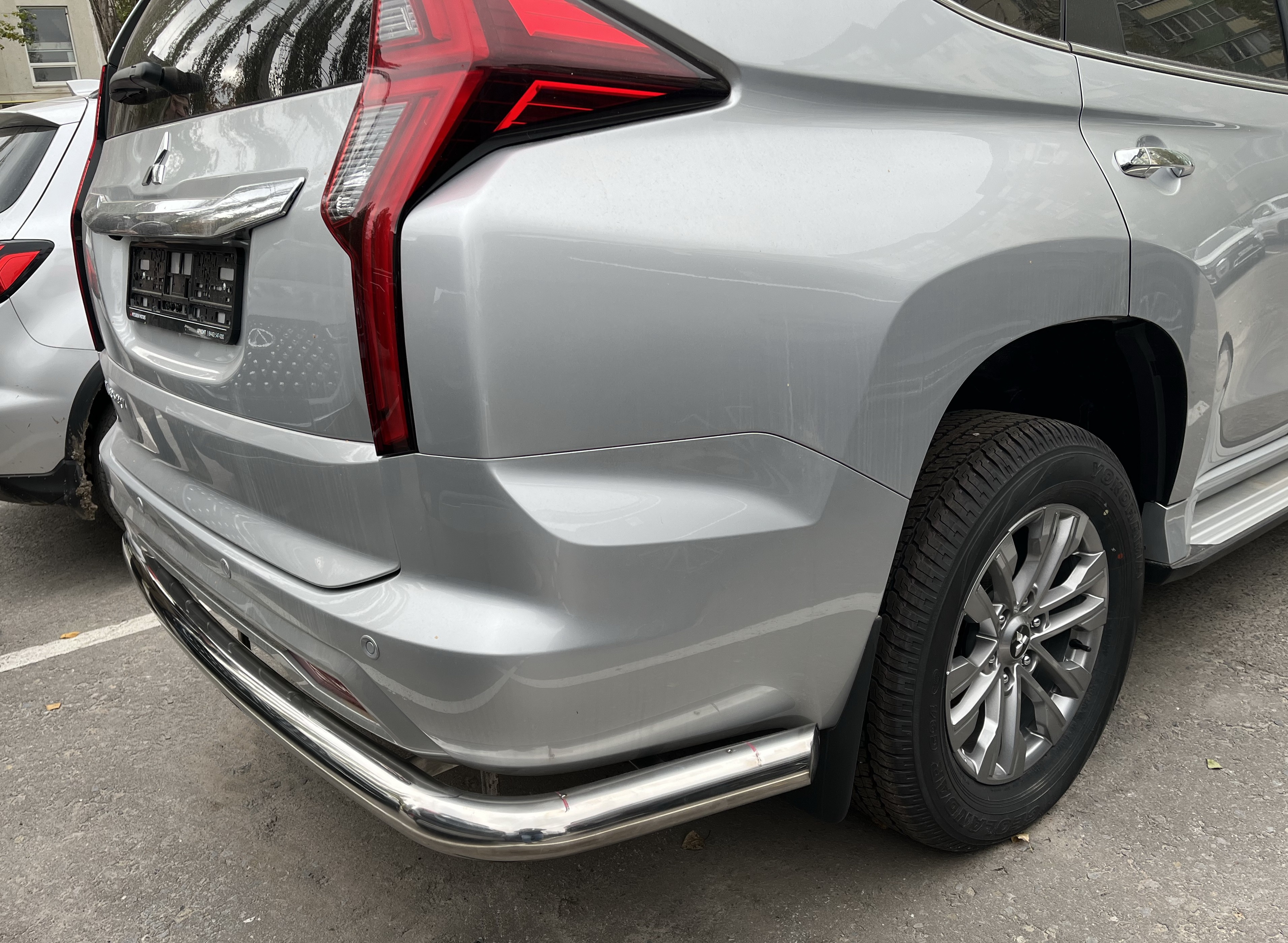 Защита заднего бампера угловая большая d76 мм для Mitsubishi Pajero Sport III Рестайлинг