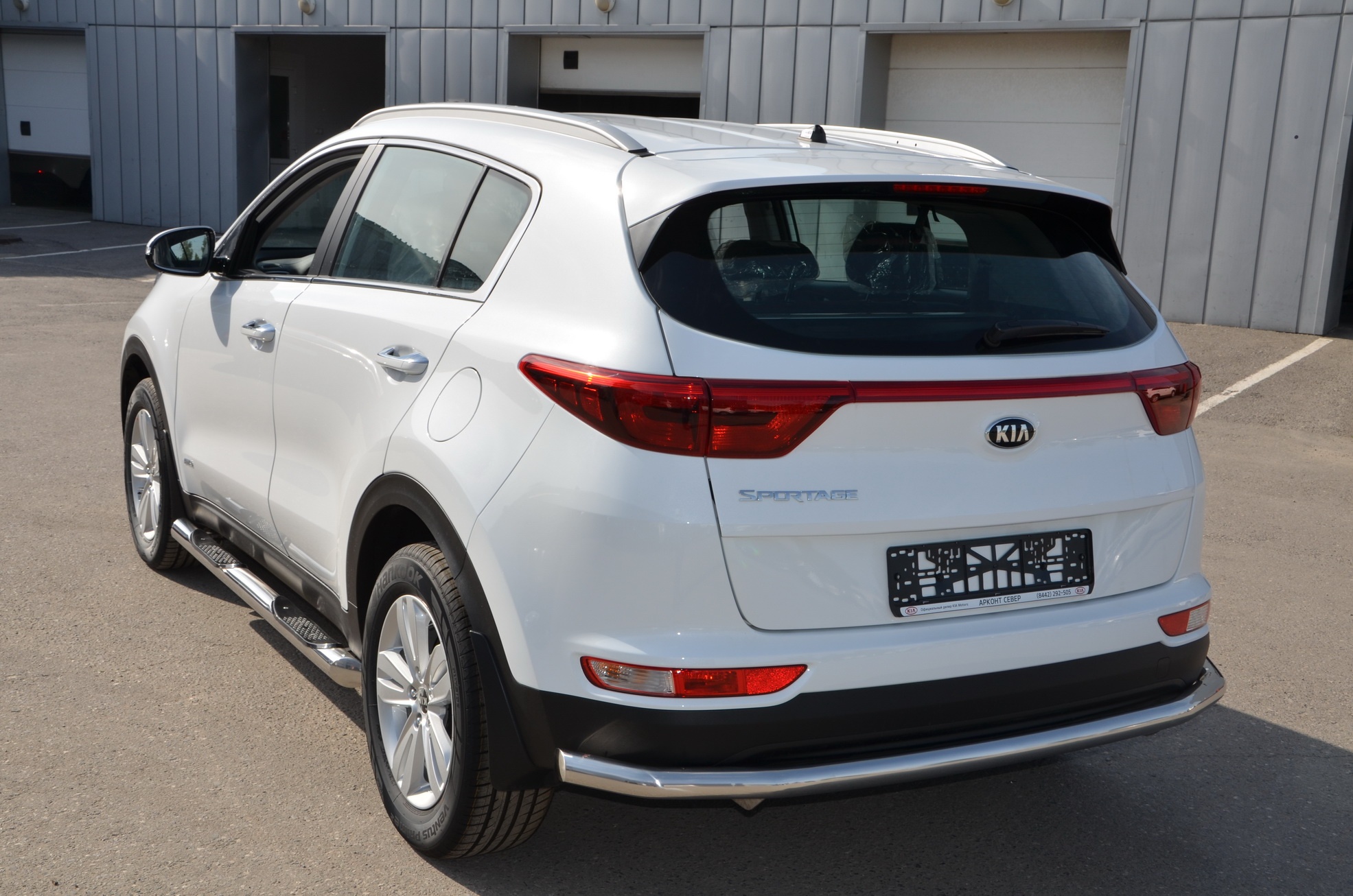 Защита заднего бампера угловая большая d60 мм для Kia Sportage III Рестайлинг