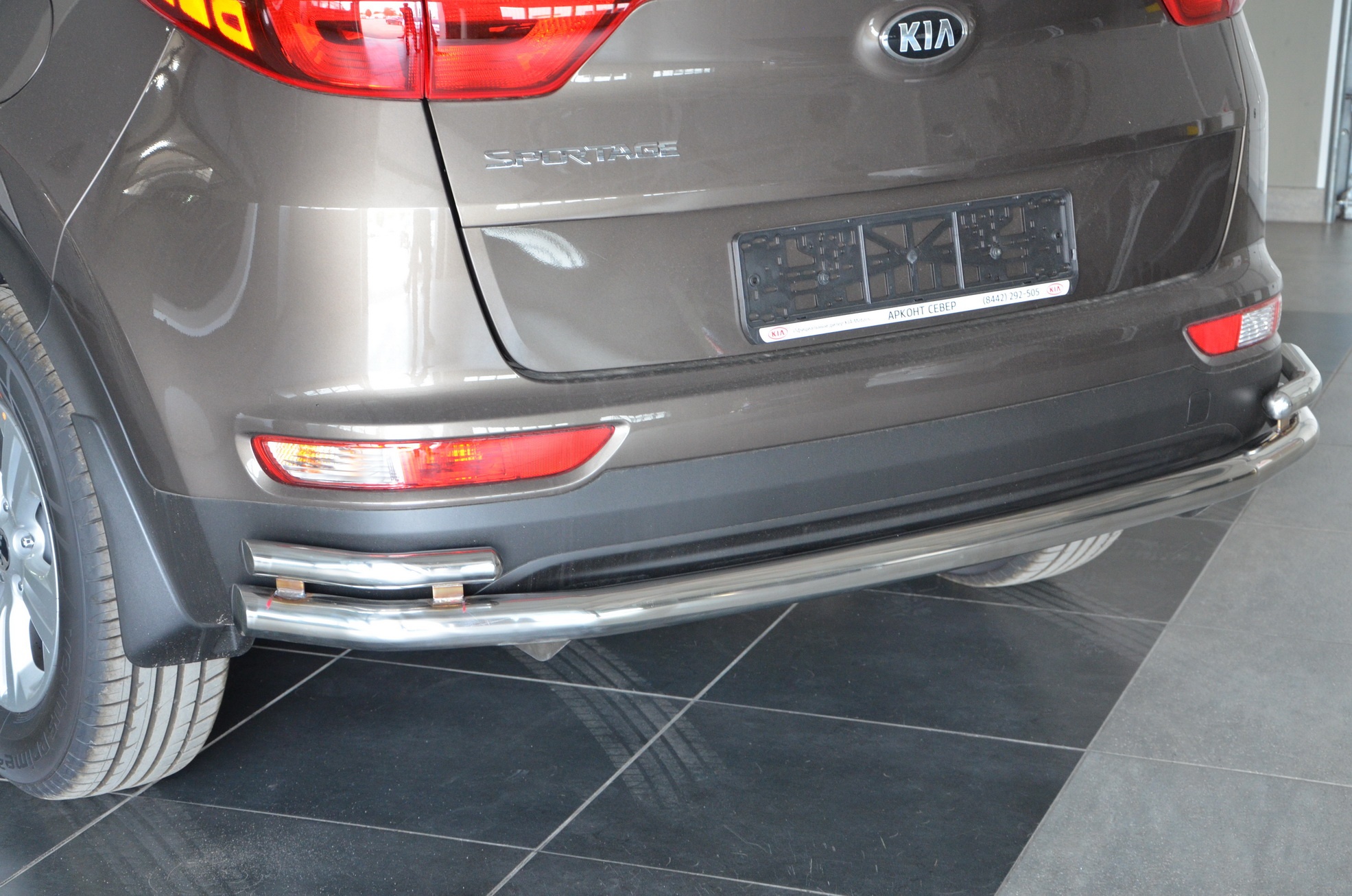 Защита заднего бампера угловая большая двойная d60/42 мм для Kia Sportage III Рестайлинг