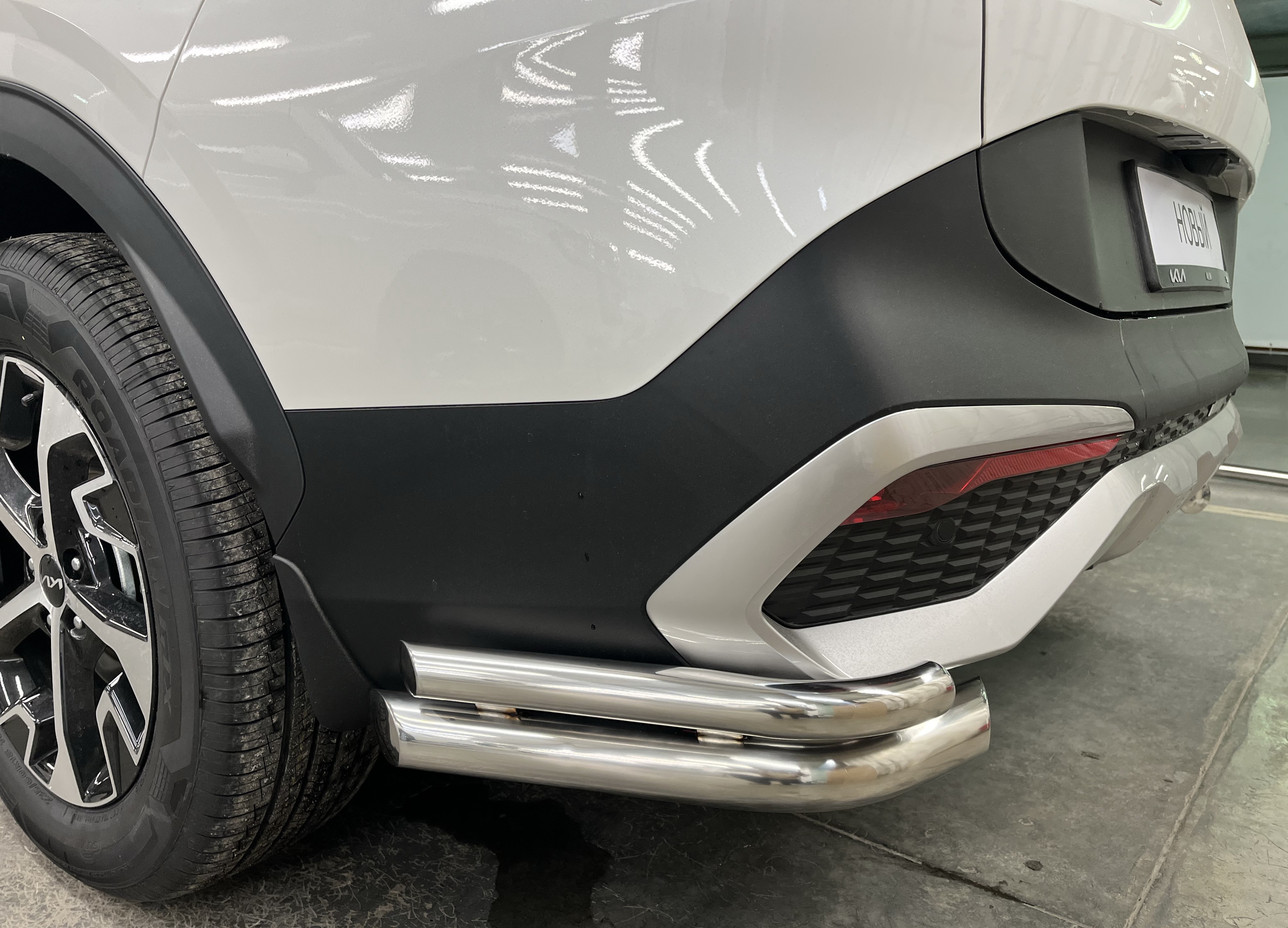 Защита заднего бампера угловая двойная d60/42 мм для Kia Sportage V