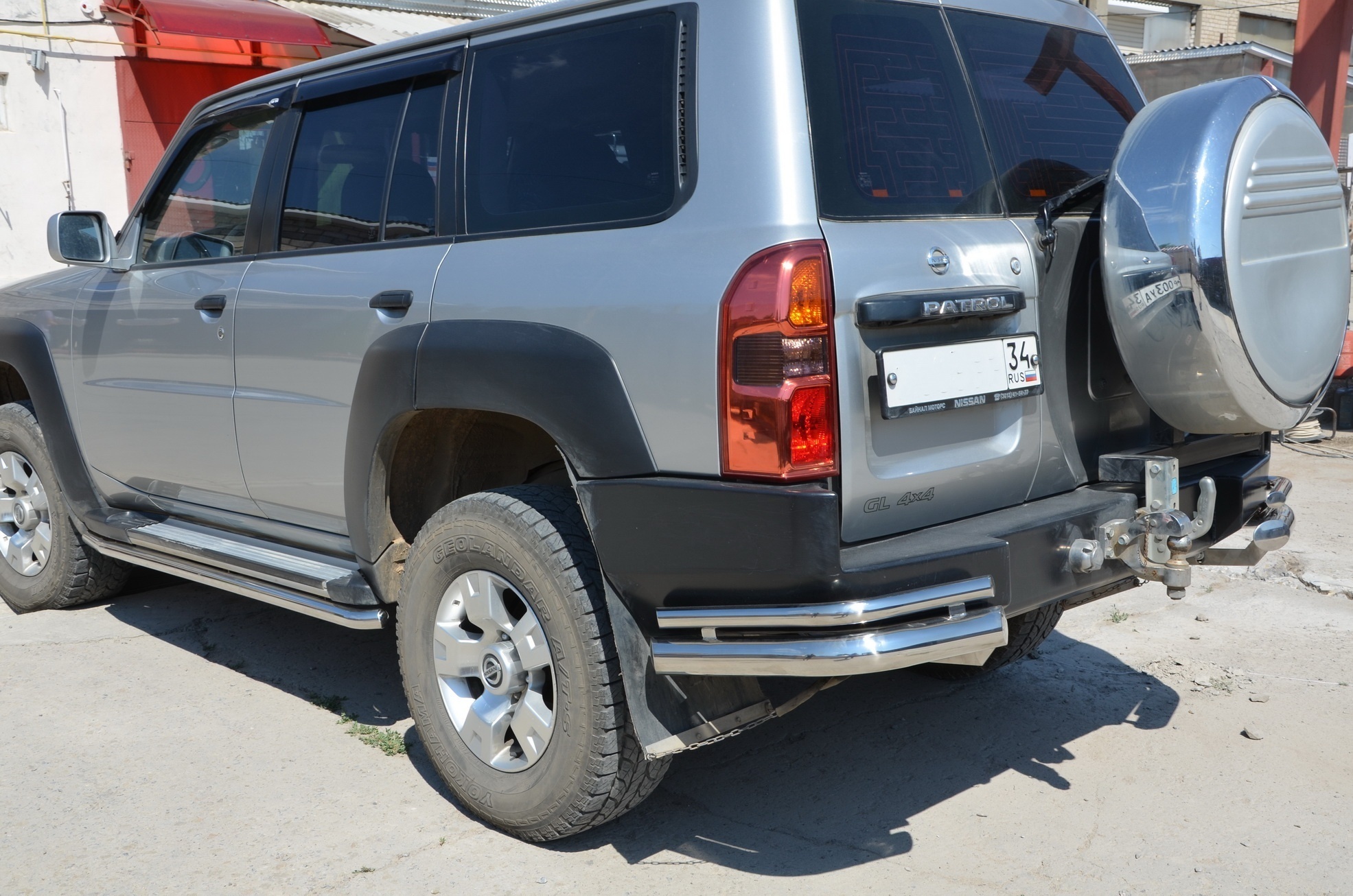 Защита заднего бампера угловая двойная d76/42 мм для Nissan Patrol V (Y61) Рестайлинг
