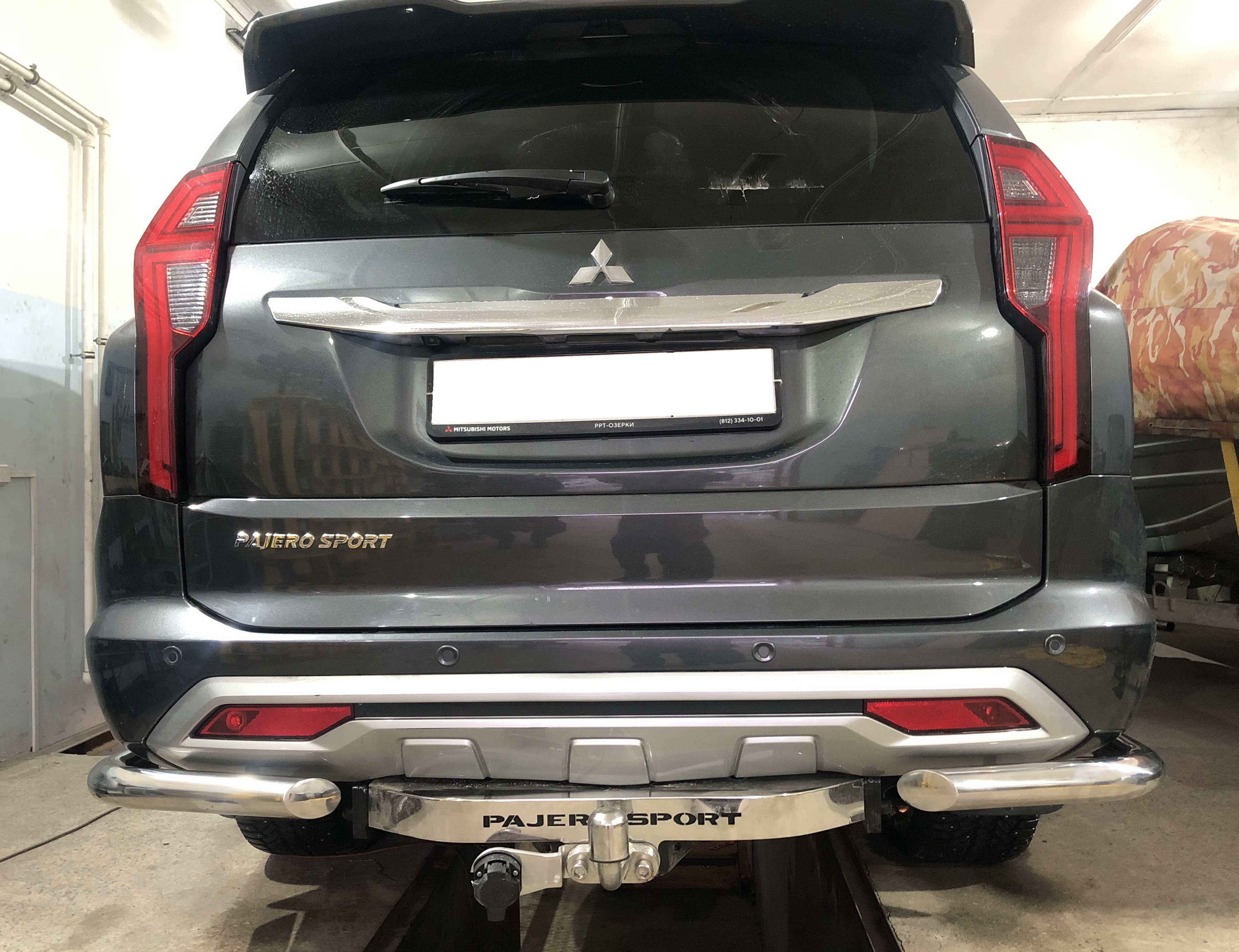 Защита заднего бампера угловая d60 мм для Mitsubishi Pajero Sport III Рестайлинг