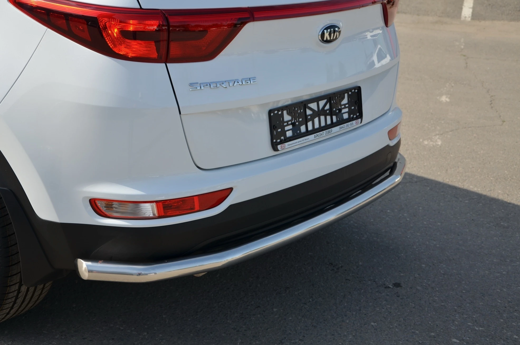 Защита заднего бампера угловая большая d60 мм для Kia Sportage III Рестайлинг  Юко KSP.15.21-1