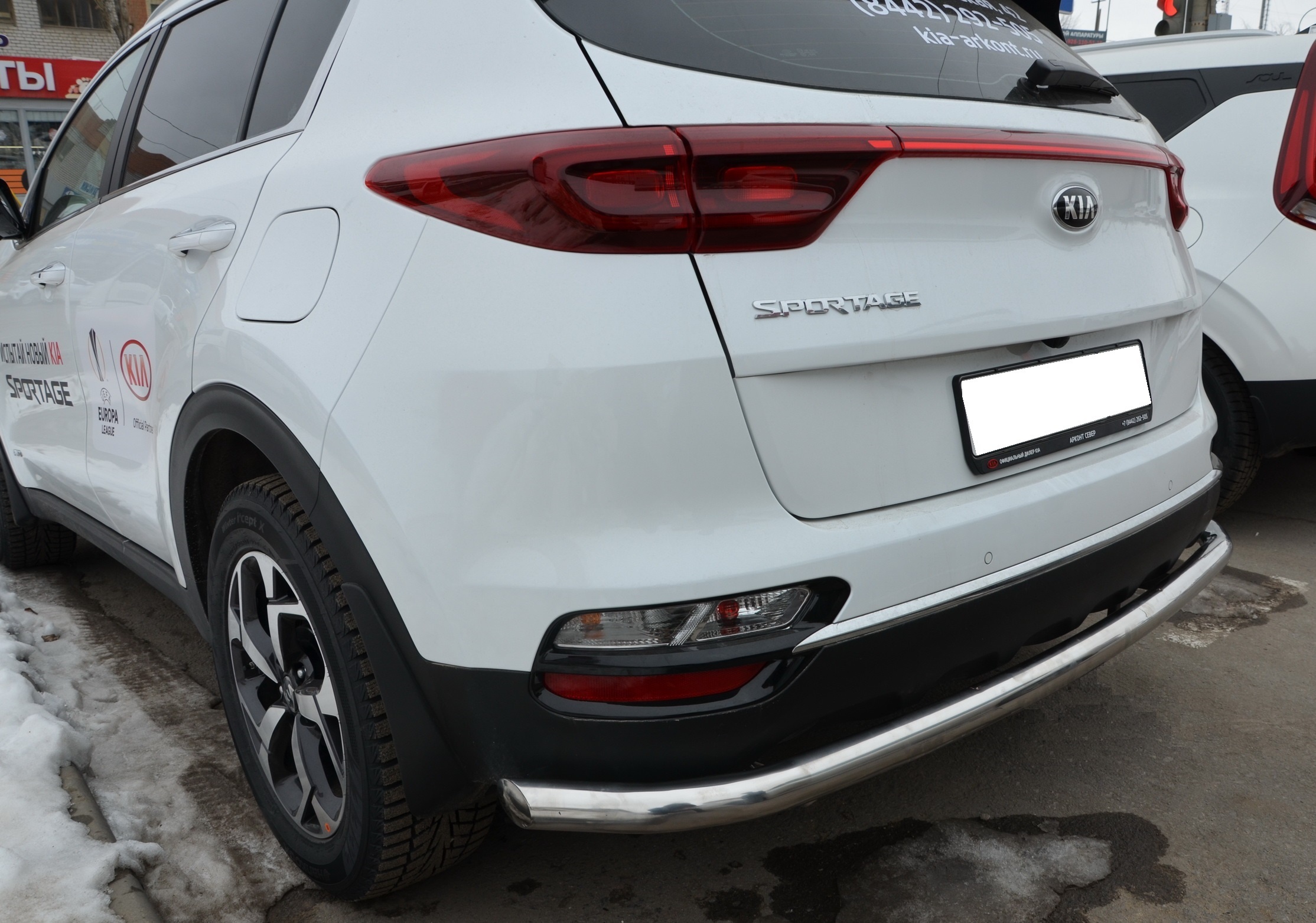 Защита заднего бампера угловая большая d60 мм для Kia Sportage IV Рестайлинг