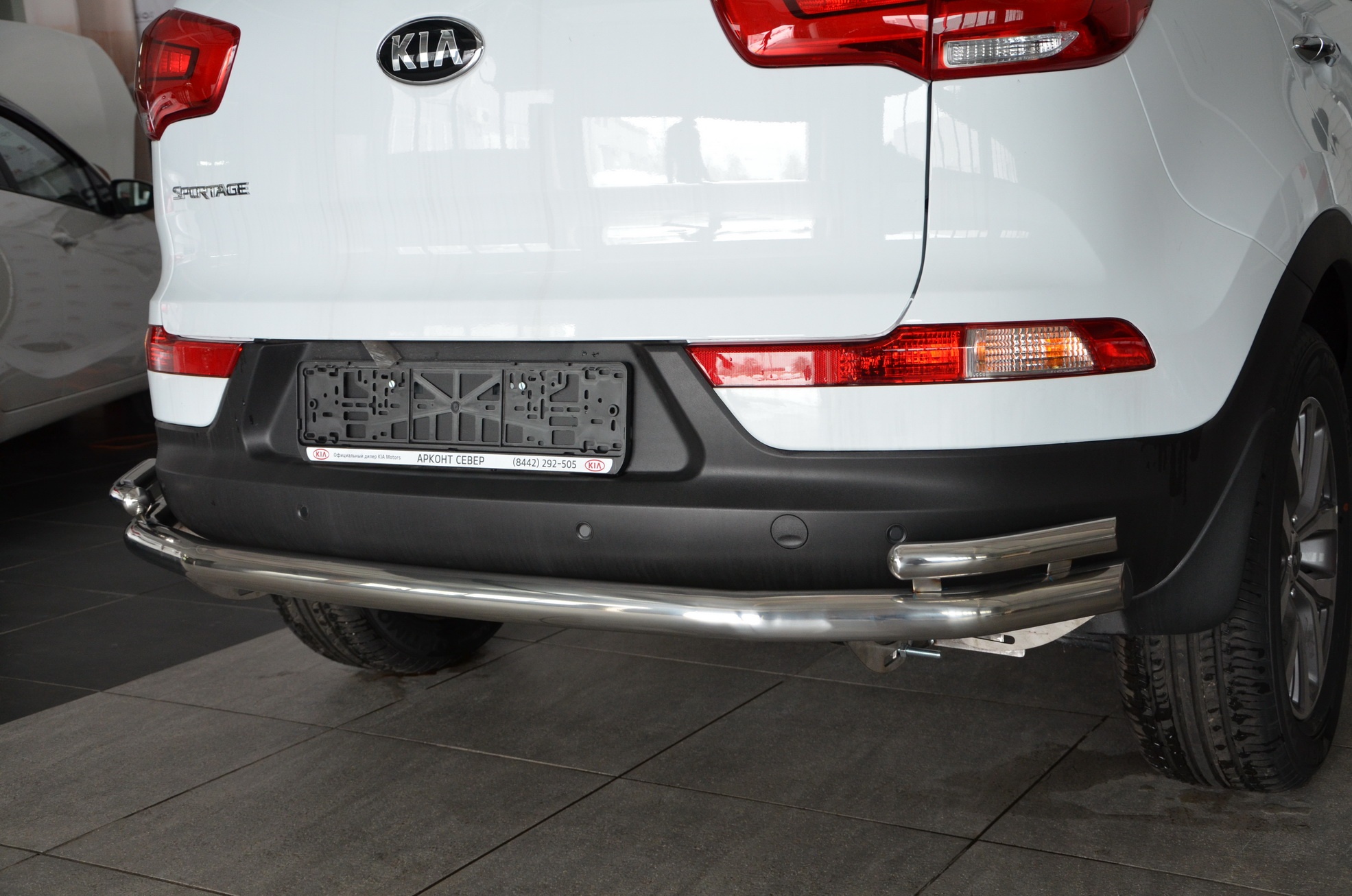 Защита заднего бампера угловая большая двойная d60/42 мм для Kia Sportage III