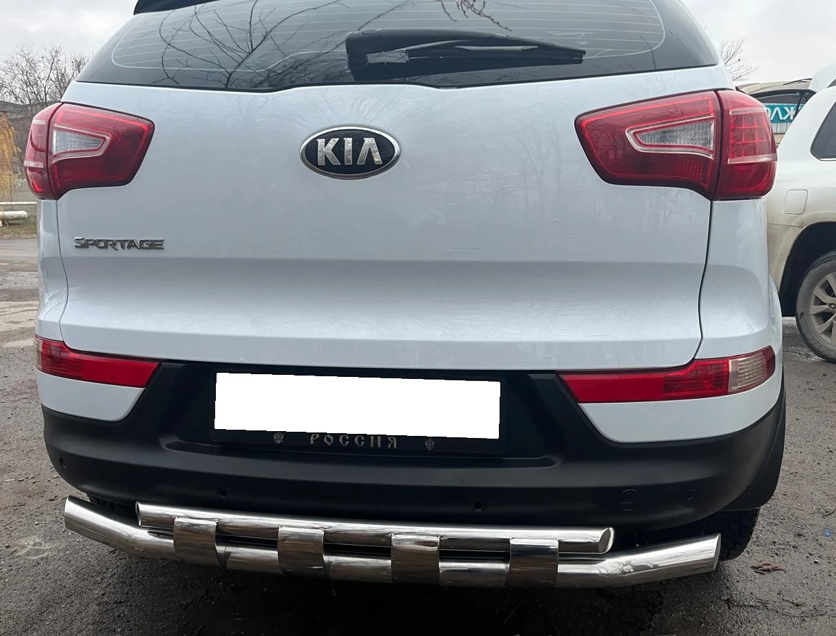 Защита заднего бампера двойная с перемычками d60/42 мм для Kia Sportage III  Юко KSP.10.25