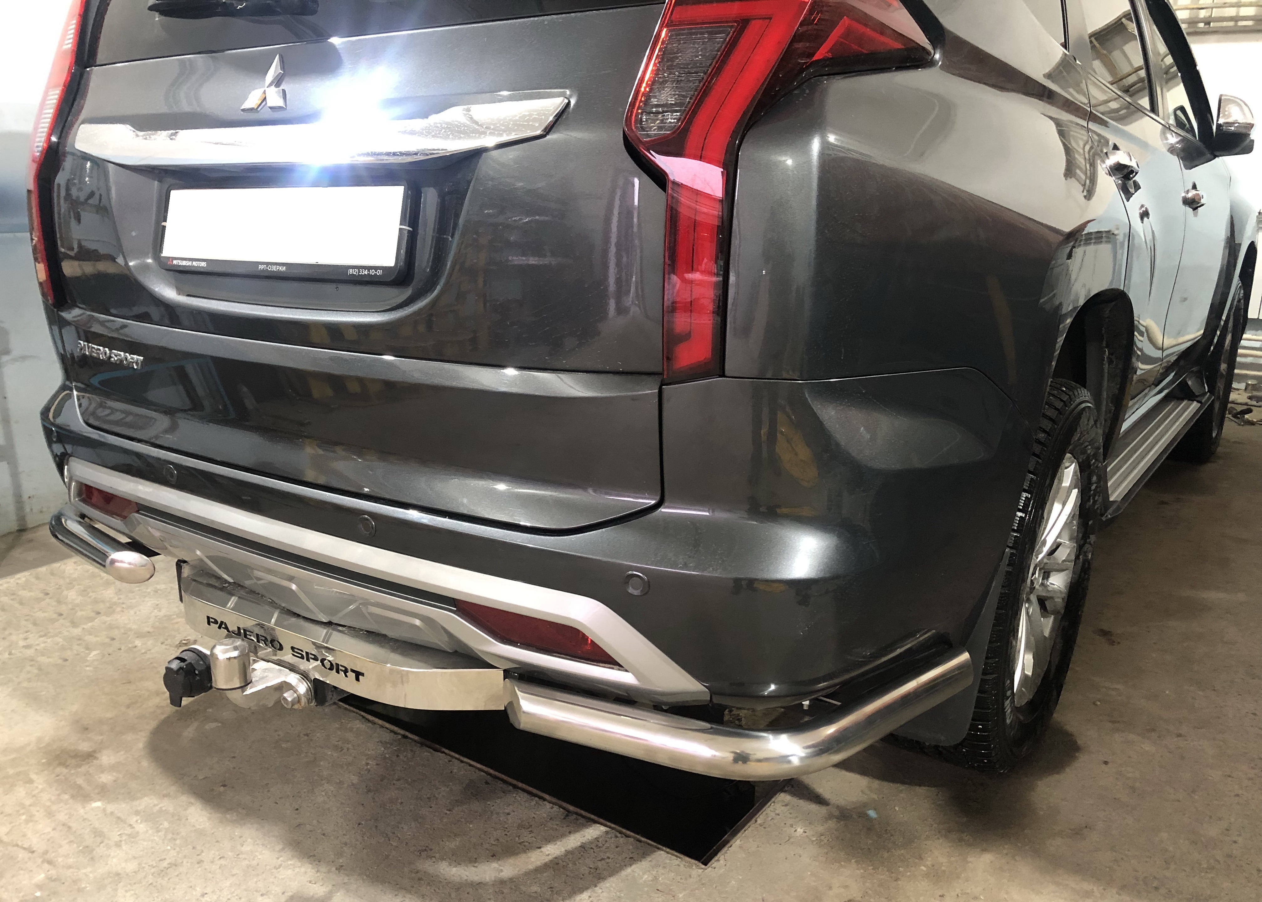 Защита заднего бампера угловая d60 мм для Mitsubishi Pajero Sport III Рестайлинг