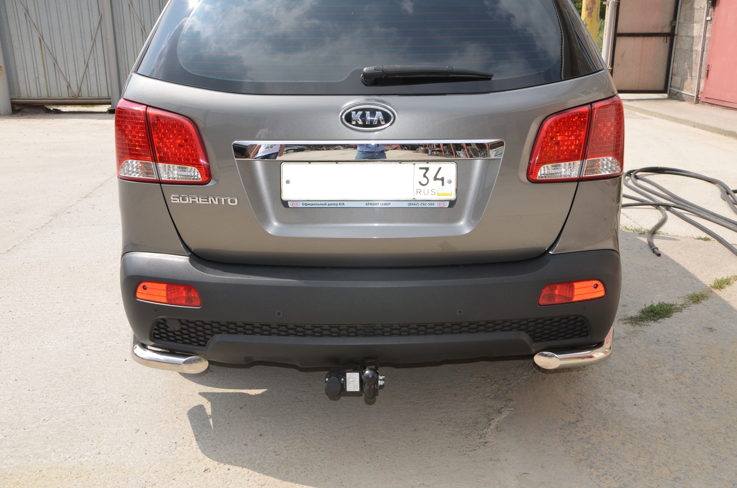 Защита заднего бампера угловая d60 мм для Kia Sorento II