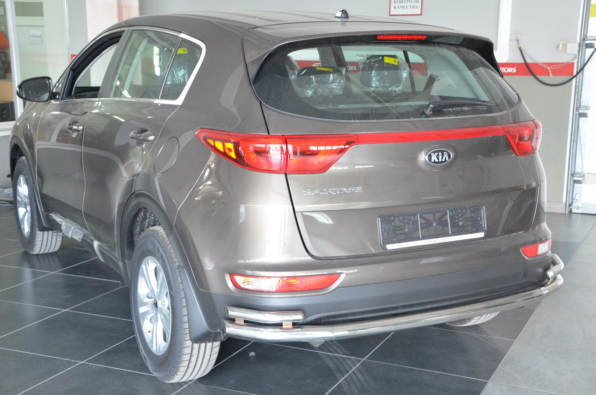 Защита заднего бампера угловая большая двойная d60/42 мм для Kia Sportage III Рестайлинг