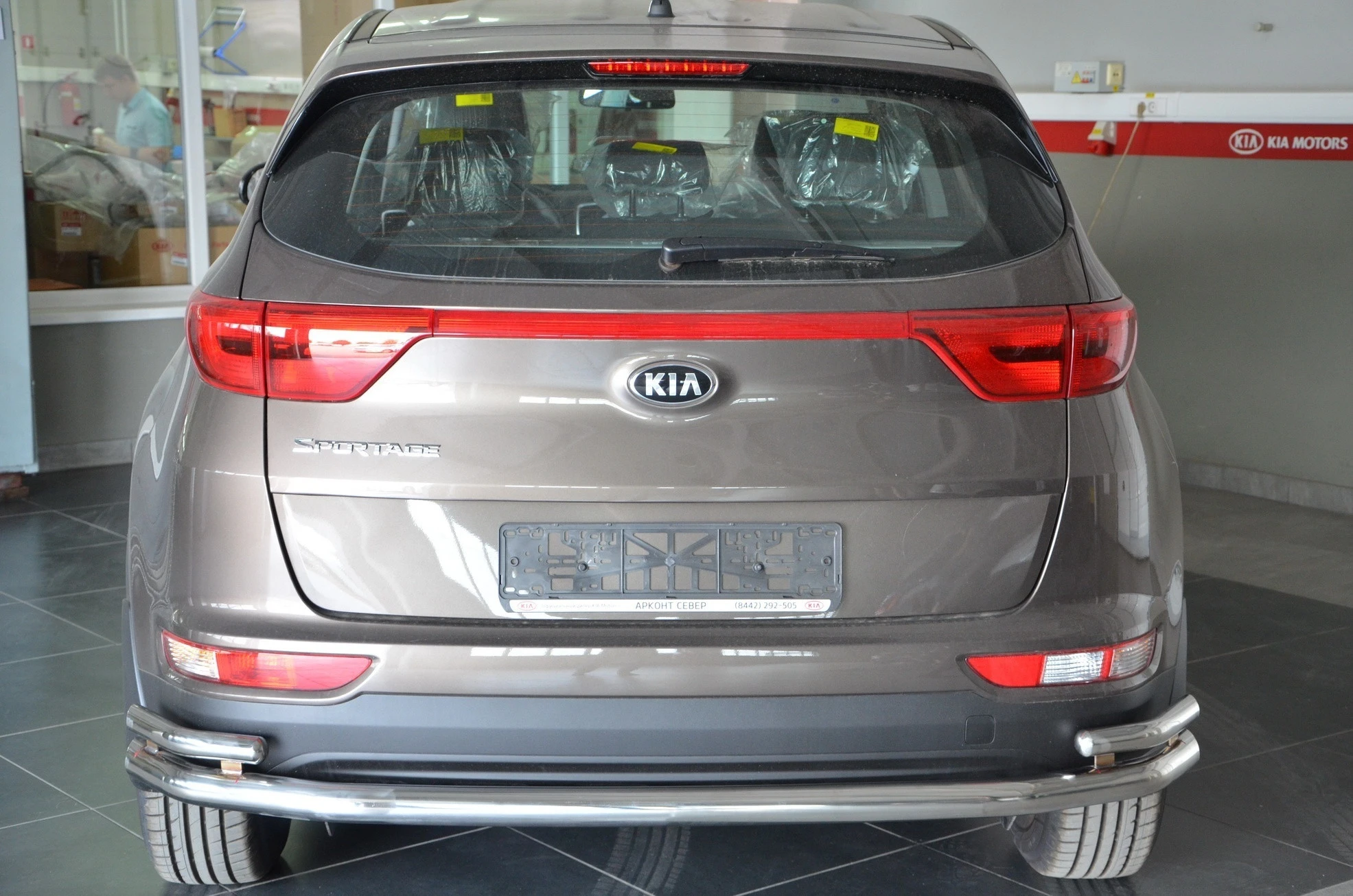 Защита заднего бампера угловая большая двойная d60/42 мм для Kia Sportage III Рестайлинг  Юко KSP.15.21