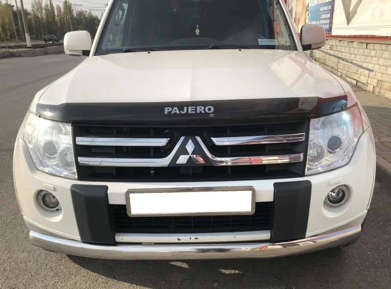 Защита переднего бампера овал d75х42 мм для Mitsubishi Pajero IV  Юко MSP4.06.02
