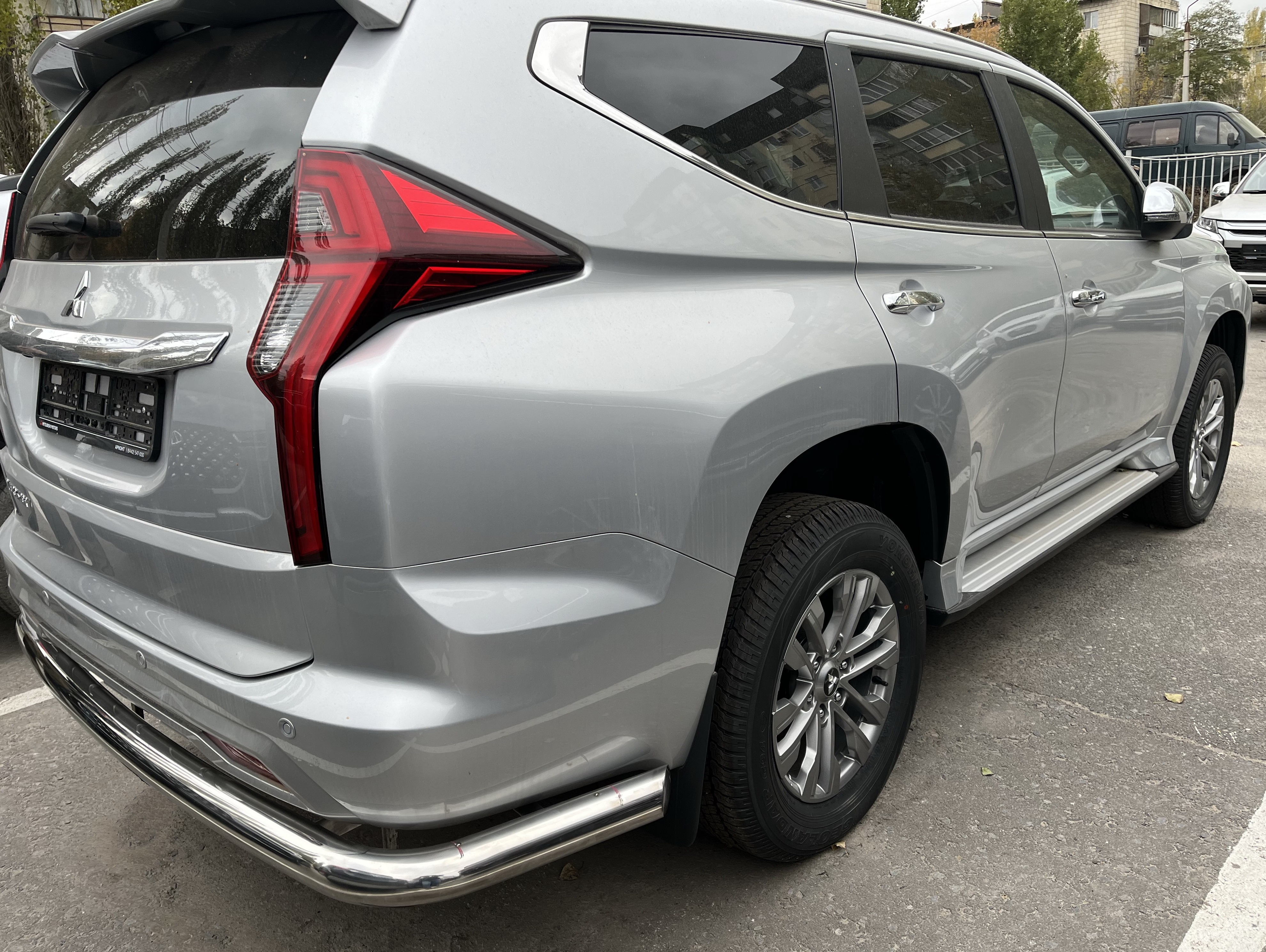 Защита заднего бампера угловая большая d76 мм для Mitsubishi Pajero Sport III Рестайлинг
