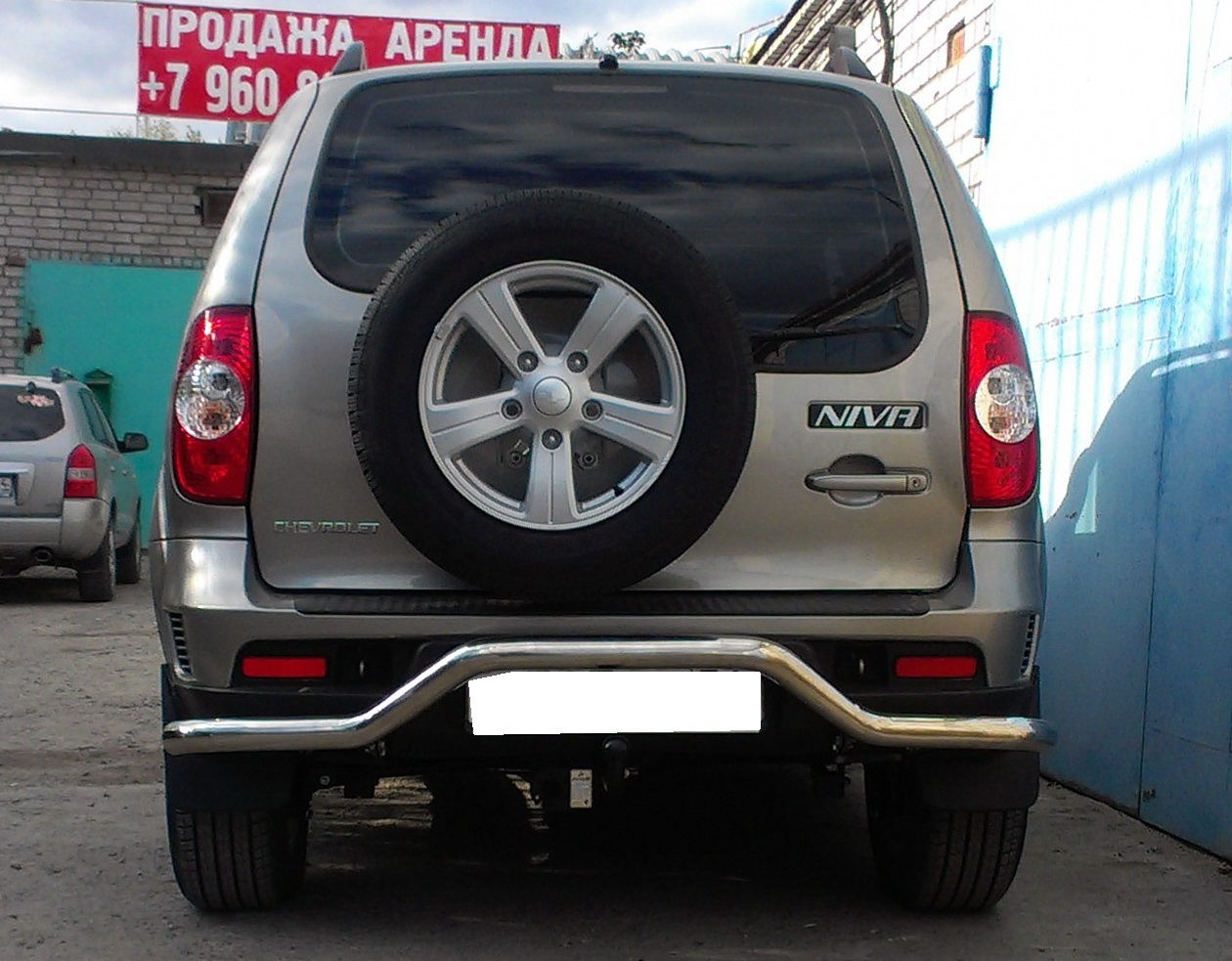 Защита заднего бампера волна d60 мм для Chevrolet Niva I Рестайлинг