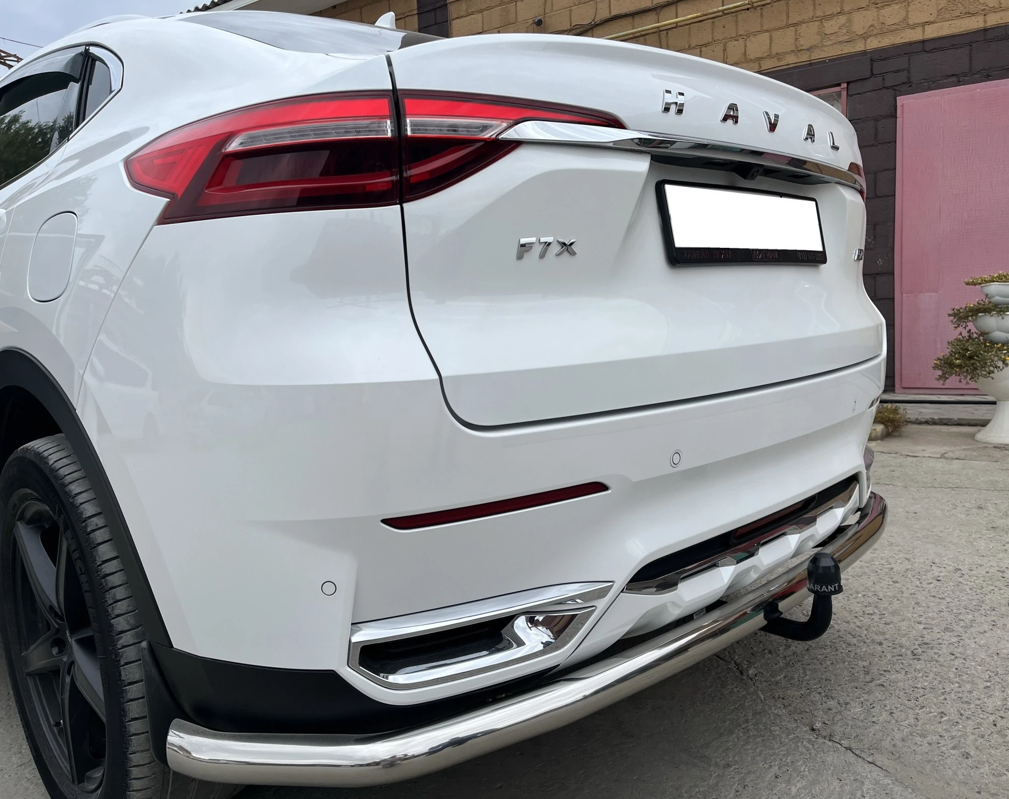 Защита заднего бампера угловая большая под фаркоп d60 мм для Haval F7x I  Юко GWF7X.19.21