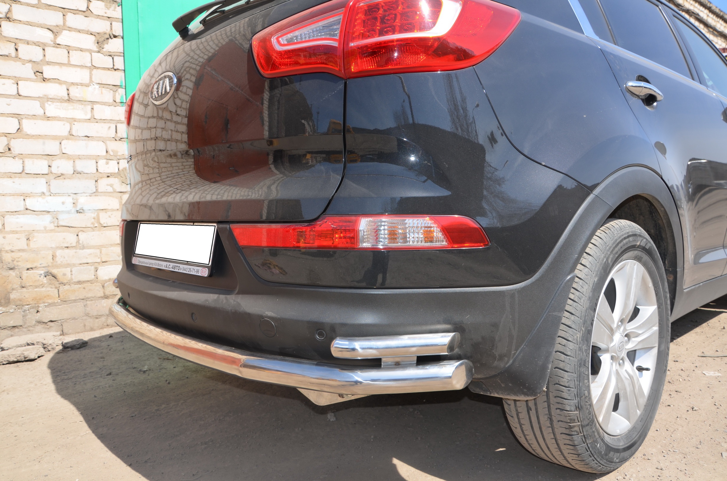 Защита заднего бампера угловая большая двойная d60/42 мм для Kia Sportage III