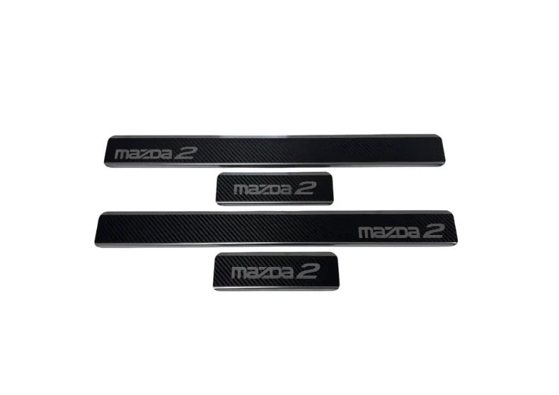Накладки на пороги нержавеющая сталь под карбон 4шт. для Mazda 2 II Рестайлинг (DE2)