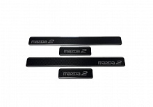 Накладки на пороги нержавеющая сталь под карбон 4шт. для Mazda 2 II Рестайлинг (DE2)